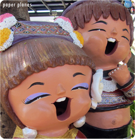 Laughing Thai figurines